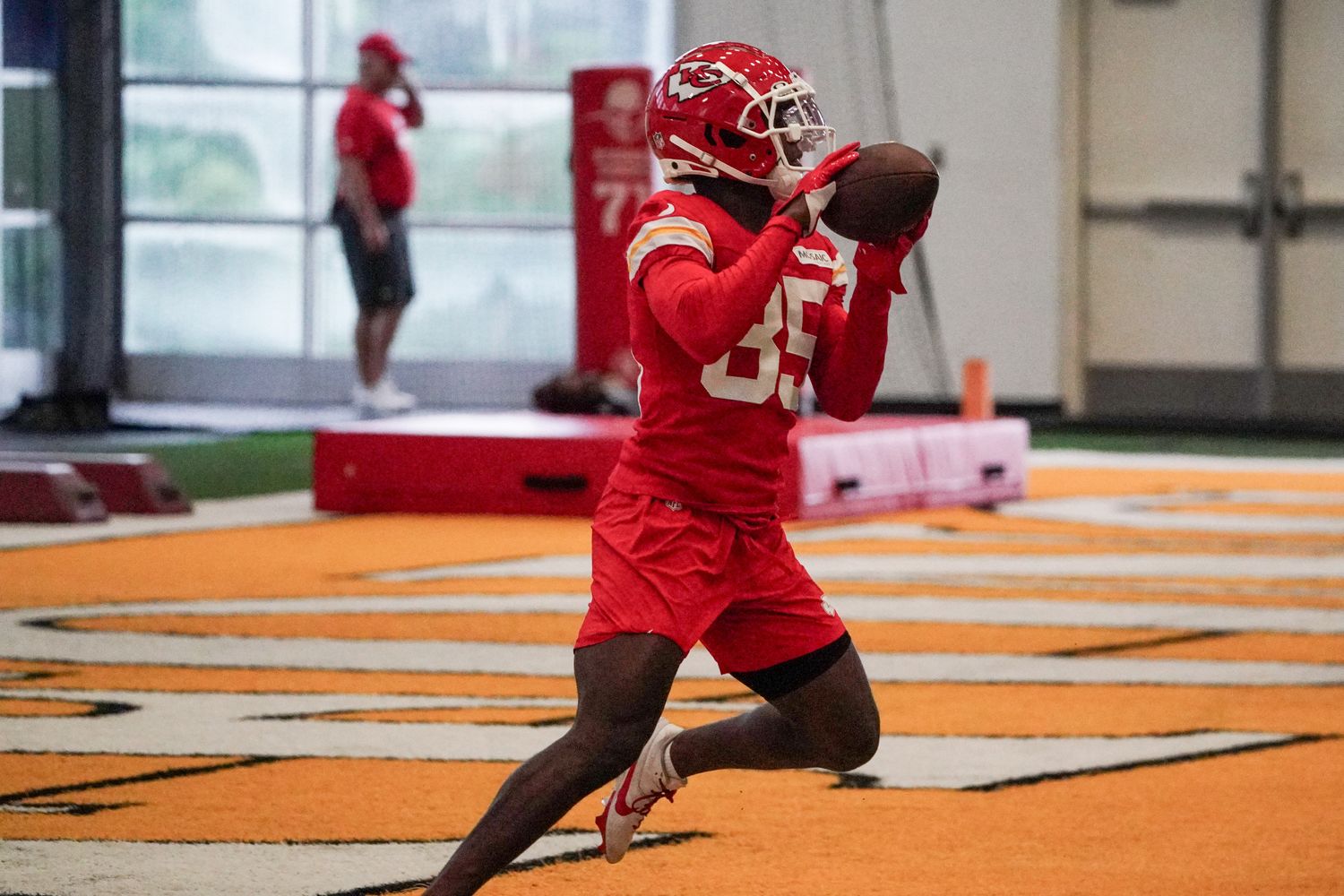 Jul 24, 2023; St. Joseph, MO, USA; Kansas City Chiefs wide receiver John Ross (85) catches a pass in the indoor practice facility during training camp at Missouri Western State University. Mandatory Credit: Denny Medley-USA TODAY Sports